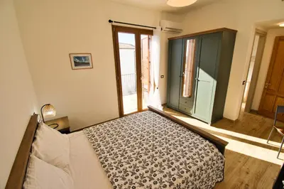 Letto o letti in una camera di Dommu Livia