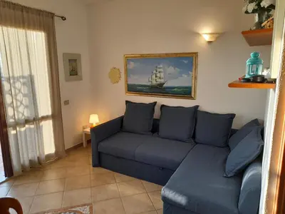 Area soggiorno di Casa vacanze con terrazza panoramica vista mare