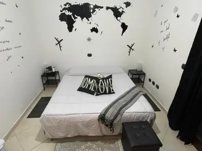 Letto o letti in una camera di Camere Aeroporto Cagliari Elmas