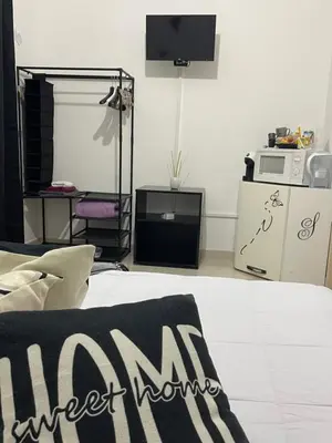 Letto o letti in una camera di Camere Aeroporto Cagliari Elmas
