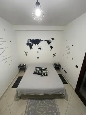 Letto o letti in una camera di Camere Aeroporto Cagliari Elmas