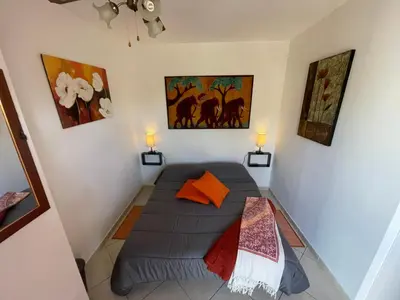 Letto o letti in una camera di Camere Aeroporto Cagliari Elmas