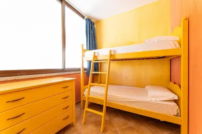 Letto o letti in una camera di Airin house with garden, Villasimius center SouthSardiniaHolidays