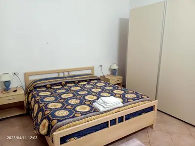 Letto o letti in una camera di Appartamenti Regina Margherita