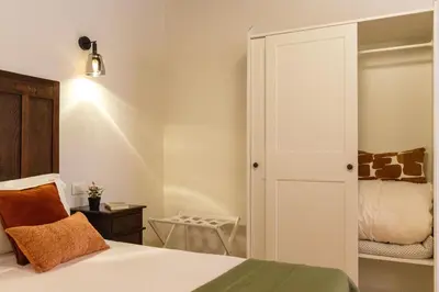 Letto o letti in una camera di Suite Martini Castello - Boutique Apartments