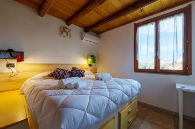 Letto o letti in una camera di Casa Cao Appartamento Il Ginepro