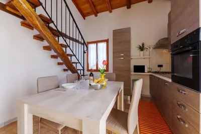 Cucina o angolo cottura di Casa Cao Appartamento Il Ginepro