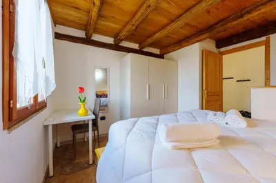Letto o letti in una camera di Casa Cao Appartamento Il Ginepro