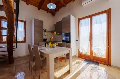 TV o dispositivi per l'intrattenimento presso Casa Cao Appartamento Il Ginepro