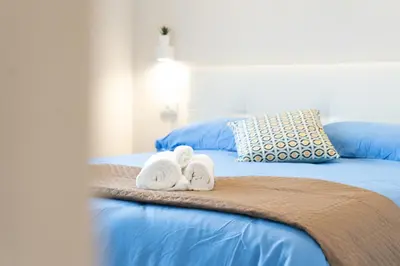 Letto o letti in una camera di Casa Luna nel Cuore di Cagliari a 10 minuti in macchina dalle Spiagge più Belle