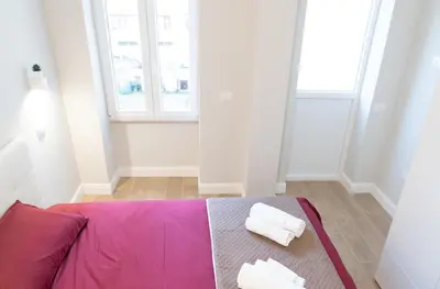 Letto o letti in una camera di Casa Luna nel Cuore di Cagliari a 10 minuti in macchina dalle Spiagge più Belle