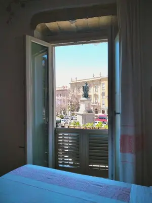 Letto o letti in una camera di Note Sulla Piazza