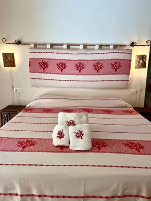 Letto o letti in una camera di Note Sulla Piazza
