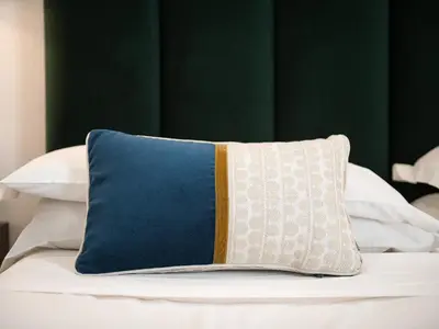 Letto o letti in una camera di PLEY Cagliari Boutique Rooms