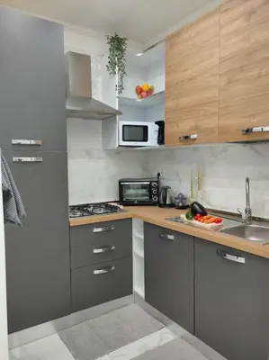 Cucina o angolo cottura di Lovely independent mini apartment central Cagliari