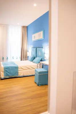Letto o letti in una camera di Berry Rooms