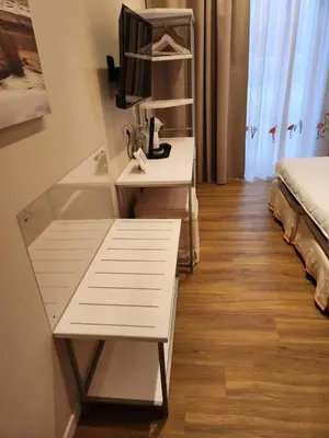 Letto o letti in una camera di Berry Rooms