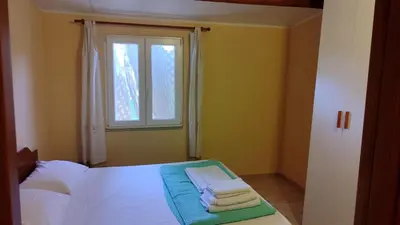 Letto o letti in una camera di Villa Fronte mare