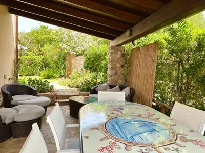 Area soggiorno di Domus Mary Cala Caterina Apartment with sea view