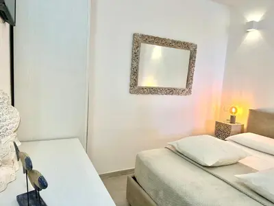 Letto o letti in una camera di Domus Angelica Apartment Charmant with sea view Villasimius