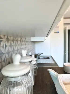 Area soggiorno di Domus Angelica Apartment Charmant with sea view Villasimius
