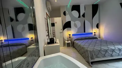 Letto o letti in una camera di Cagliari Love Suite