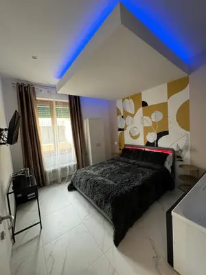 Letto o letti in una camera di Cagliari Love Suite