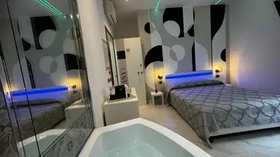 Letto o letti in una camera di Cagliari Love Suite