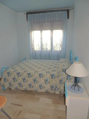 Letto o letti in una camera di Appartamento Mariolu 3