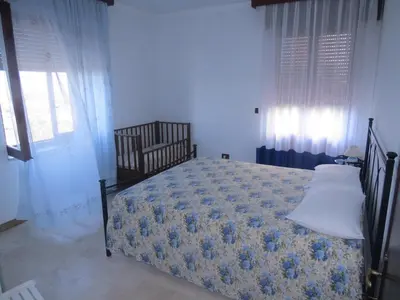 Letto o letti in una camera di Appartamento Mariolu 3