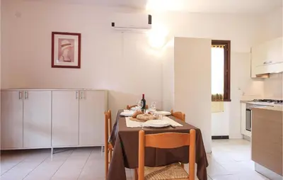 Cucina o angolo cottura di Beautiful Apartment In Costa Rei -Ca-