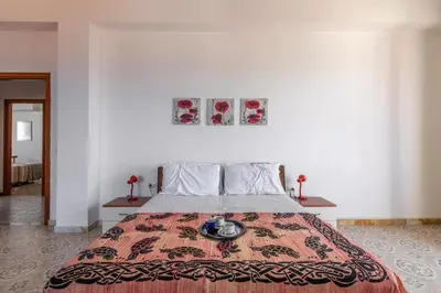 Letto o letti in una camera di Ca' da Tina - Calamenhir