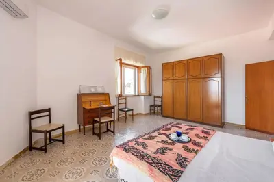 Letto o letti in una camera di Ca' da Tina - Calamenhir
