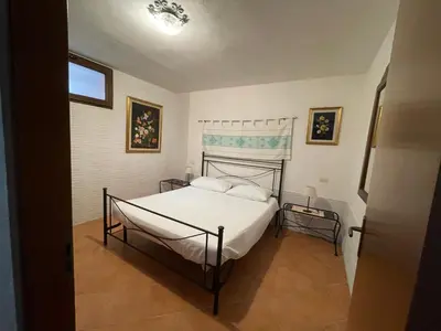 Letto o letti in una camera di Casa Grazia e Enrico