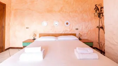 Letto o letti in una camera di Il Corbezzolo