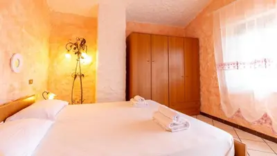 Letto o letti in una camera di Il Corbezzolo