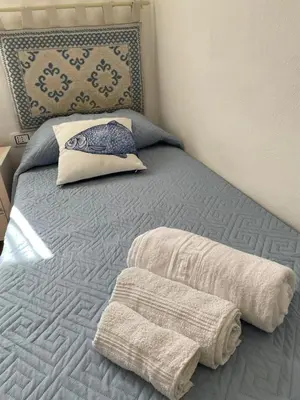 Letto o letti in una camera di Casa Marina