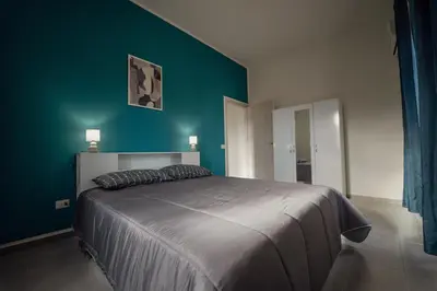 Letto o letti in una camera di Casa Vacanze - Il Balconcino sul Castello