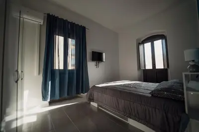 Letto o letti in una camera di Casa Vacanze - Il Balconcino sul Castello