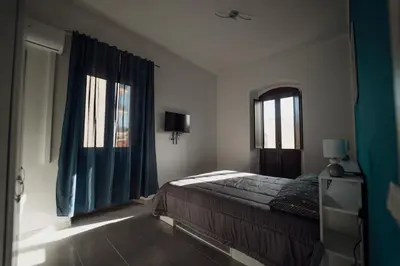 Letto o letti in una camera di Casa Vacanze - Il Balconcino sul Castello