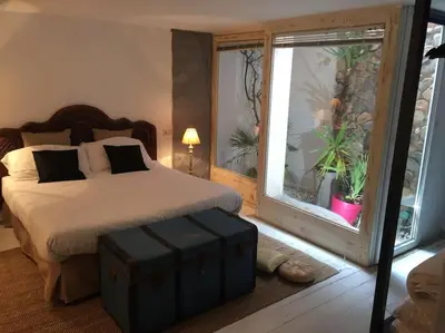 Letto o letti in una camera di Villa Milli