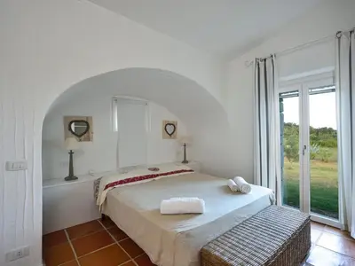 Letto o letti in una camera di Casa Li Conchi H