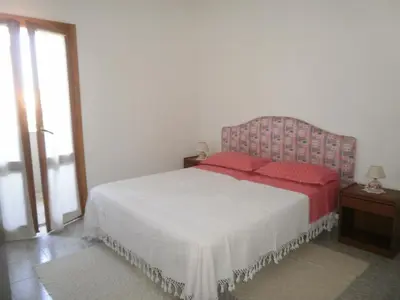 Letto o letti in una camera di Scalas House