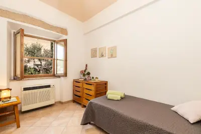 Letto o letti in una camera di VILLA ISOLOTTO a 150 m dal mare