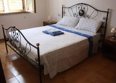 Letto o letti in una camera di Casablu