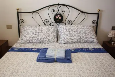 Letto o letti in una camera di Casablu