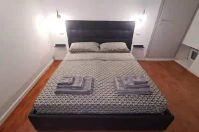 Letto o letti in una camera di Appartamento al centro di Cagliari (Marina)