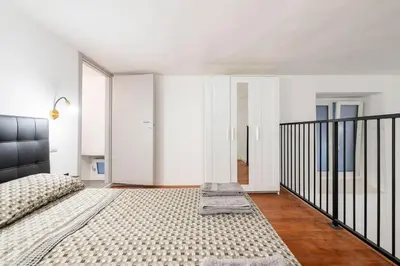 Letto o letti in una camera di Appartamento al centro di Cagliari (Marina)