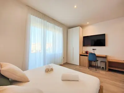 Letto o letti in una camera di Galleria Roma Art Guesthouse