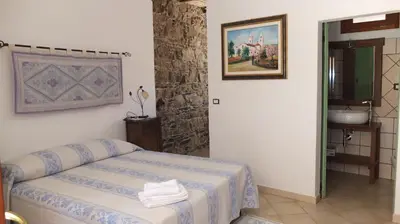 Letto o letti in una camera di Casa Camilla Sardegna